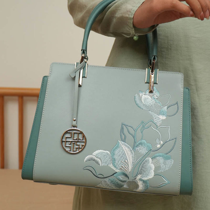 Handtasche aus echtem Leder mit Magnolienblumen-Stickerei