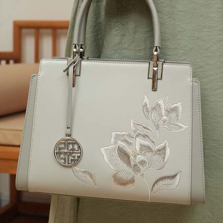 Handtasche aus echtem Leder mit Magnolienblumen-Stickerei
