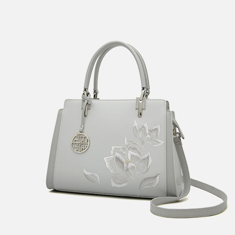 Handtasche aus echtem Leder mit Magnolienblumen-Stickerei