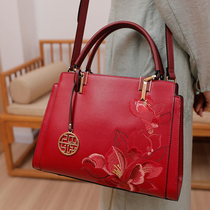 Handtasche aus echtem Leder mit Magnolienblumen-Stickerei