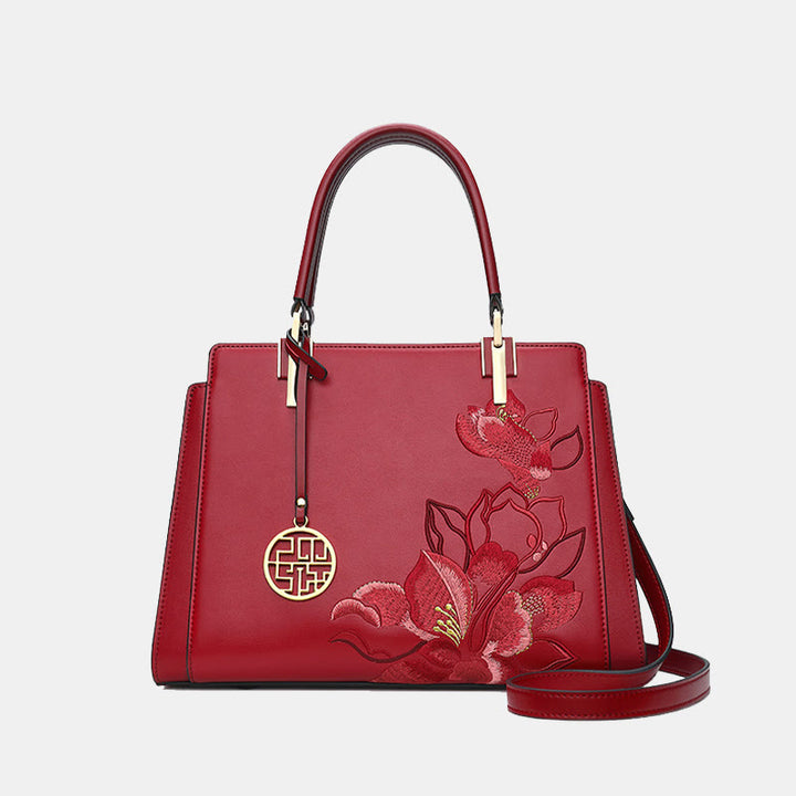 Handtasche aus echtem Leder mit Magnolienblumen-Stickerei