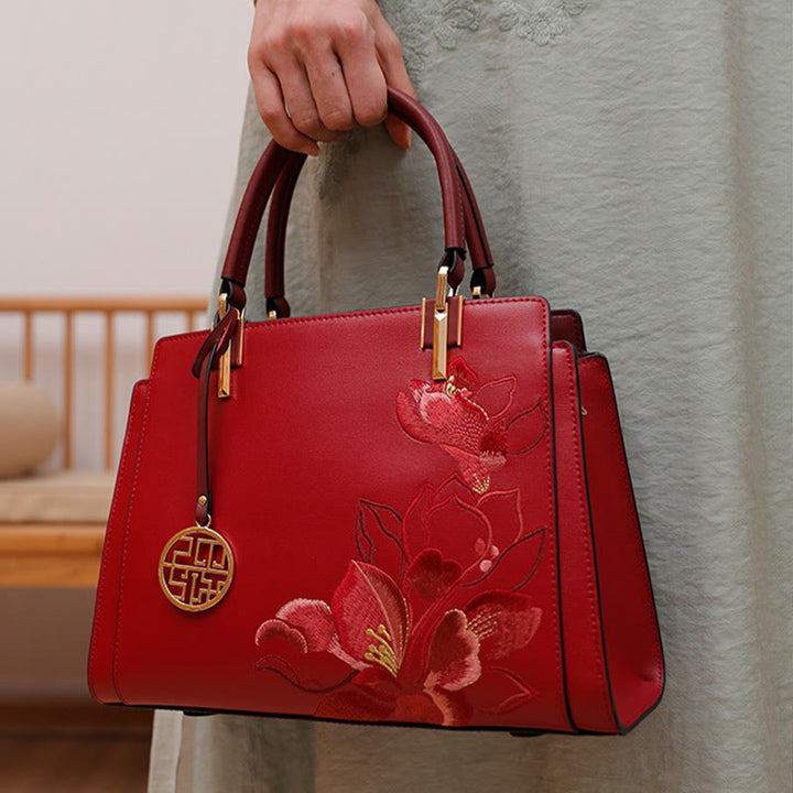 Handtasche aus echtem Leder mit Magnolienblumen-Stickerei