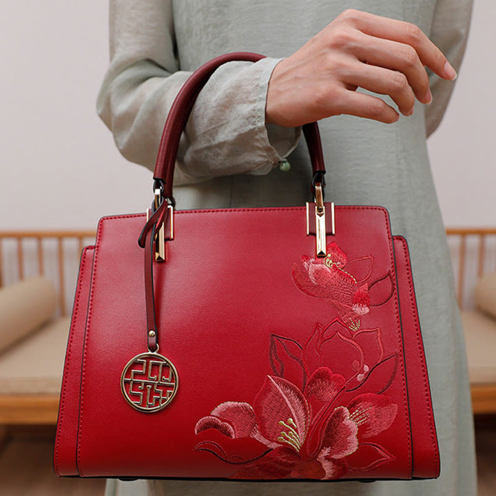 Handtasche aus echtem Leder mit Magnolienblumen-Stickerei