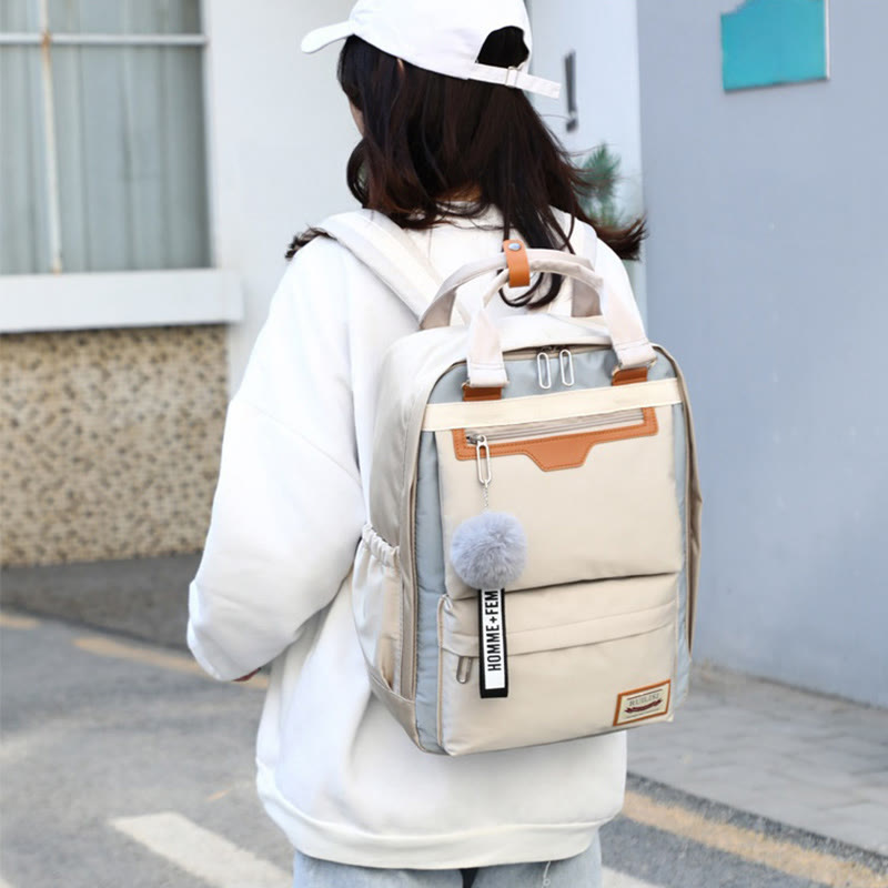Modischer Patchwork-Rucksack mit Farbblockdesign und mehreren Taschen