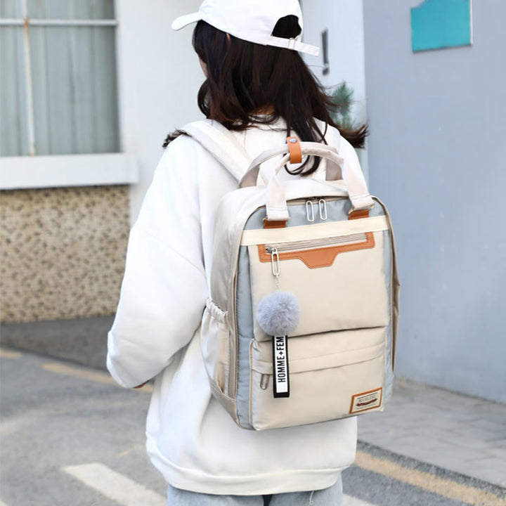 Modischer Patchwork-Rucksack mit Farbblockdesign und mehreren Taschen
