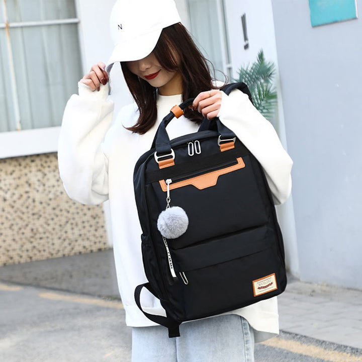 Modischer Patchwork-Rucksack mit Farbblockdesign und mehreren Taschen