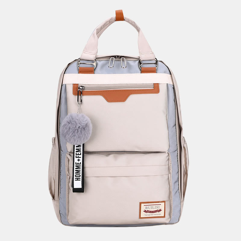 Modischer Patchwork-Rucksack mit Farbblockdesign und mehreren Taschen
