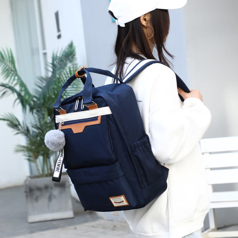 Modischer Patchwork-Rucksack mit Farbblockdesign und mehreren Taschen