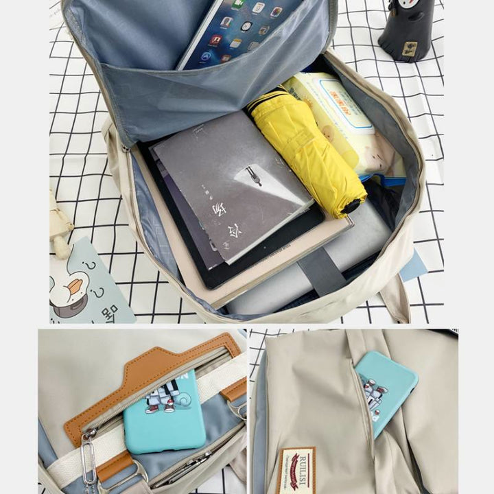 Modischer Patchwork-Rucksack mit Farbblockdesign und mehreren Taschen
