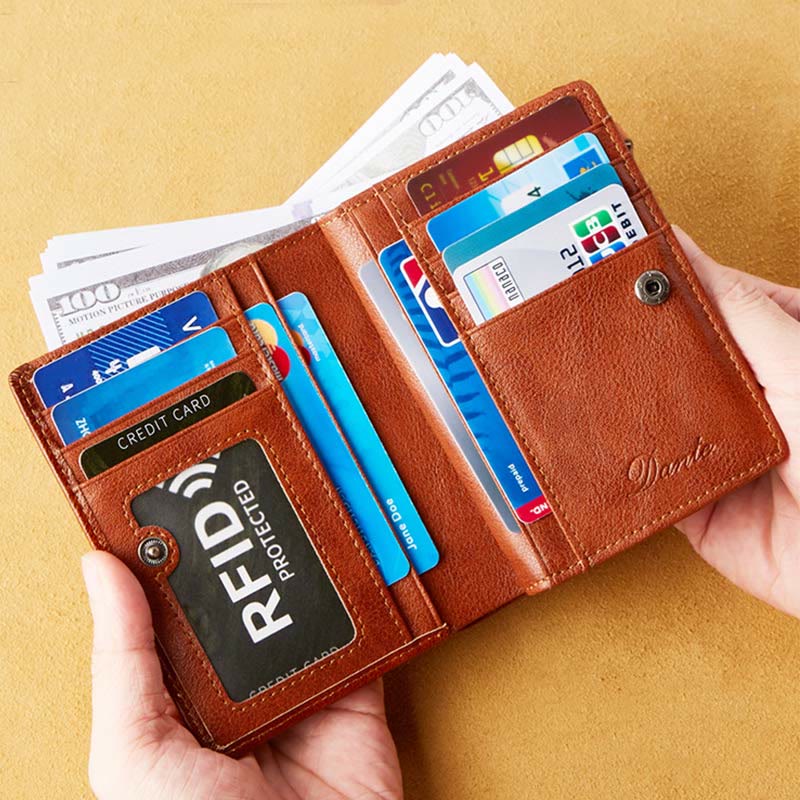 Retro RFID-blockierende zweifach faltbare Lederbrieftasche für Herren mit Reißverschlussfach