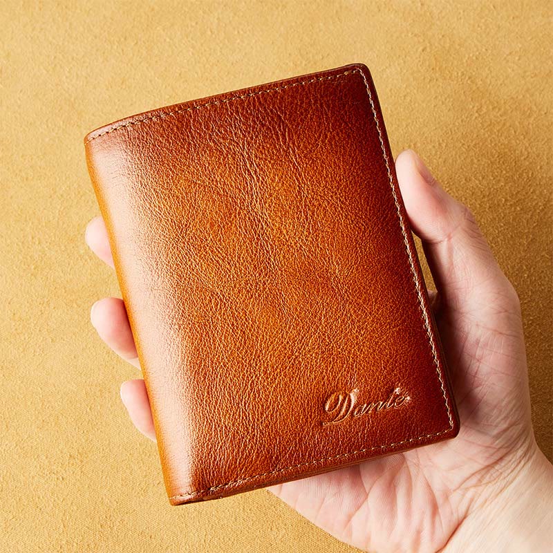 Retro RFID-blockierende zweifach faltbare Lederbrieftasche für Herren mit Reißverschlussfach