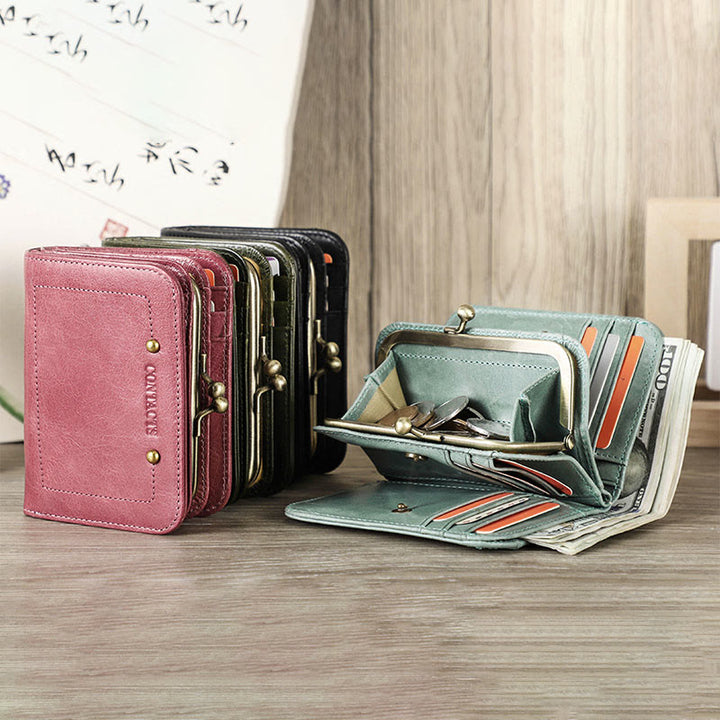 Dreifach faltbare Lederbrieftasche mit RFID-Schutz und Kiss-Lock-Münzfach