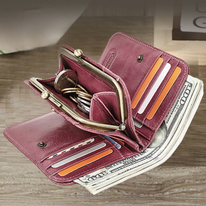 Dreifach faltbare Lederbrieftasche mit RFID-Schutz und Kiss-Lock-Münzfach