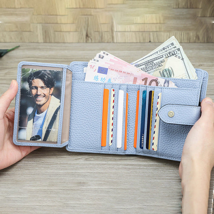 RFID-blockierende dreifach faltbare Geldbörse aus echtem Leder mit Litschi-Struktur