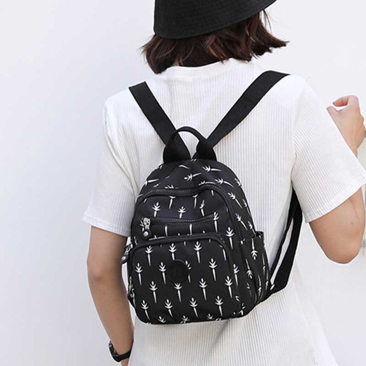 Leichter kompakter Reise-Rucksack für Frauen Funktionaler Mini-Rucksack