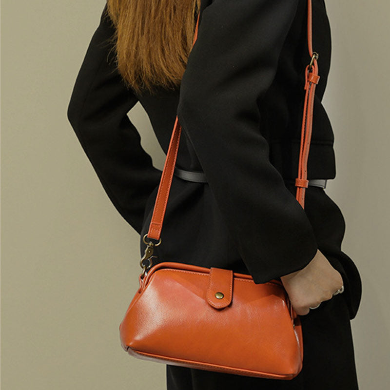 Retro-Handtasche aus echtem Leder mit einzigartiger Öffnung