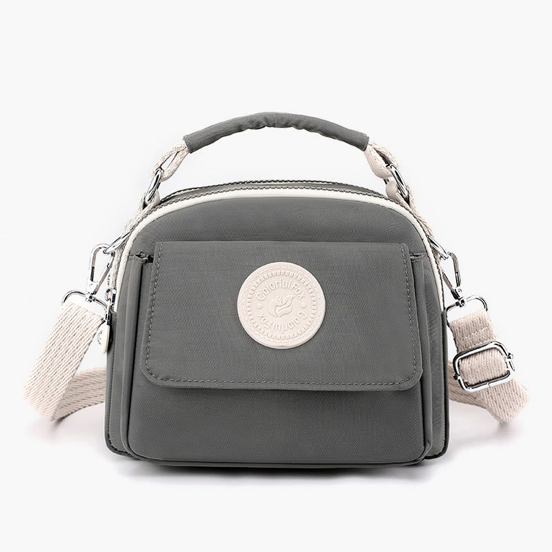 Tasche mit Griff oben für Damen, einfache, tragbare Umhängetasche mit Spritzschutz