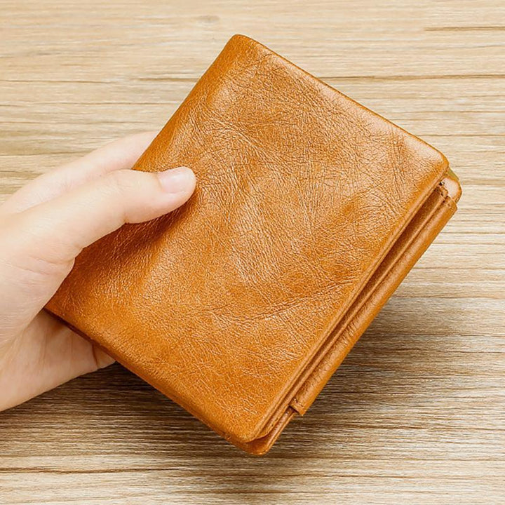 Dreifach gefaltete RFID-Geldbörse aus echtem Leder im Vintage-Stil