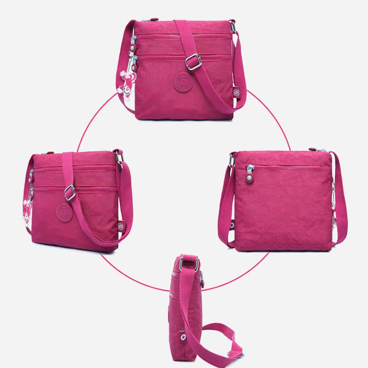 Leichte kleine Crossbody-Tasche mit Dreifach-Reißverschluss, Schultertasche für Damen