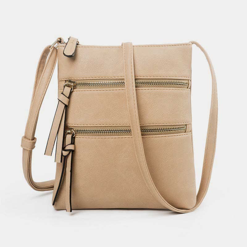 Multifunktionale Umhängetasche mit dreifachem Reißverschluss und trendigem Design aus Leder
