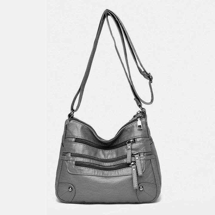 Umhängetasche mit großem Fassungsvermögen und mehreren Taschen