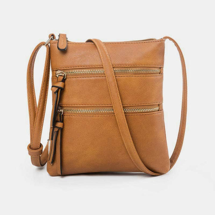 Multifunktionale Umhängetasche mit dreifachem Reißverschluss und trendigem Design aus Leder
