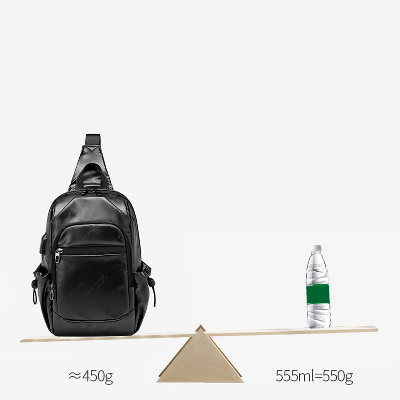 Kleine schwarze Sling-Umhängetasche für Damen und Herren, Tagesrucksack mit USB-Ladegerät