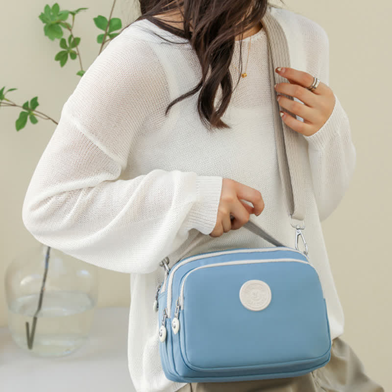 Kleine Handtasche mit dreifachem Reißverschluss für Damen, leichte, wasserdichte Umhängetasche