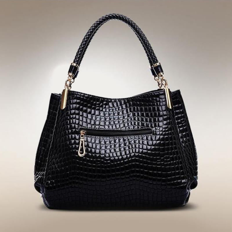 Minimalistische Damen-Tasche mit Henkel und Krokodilmuster aus veganem Leder