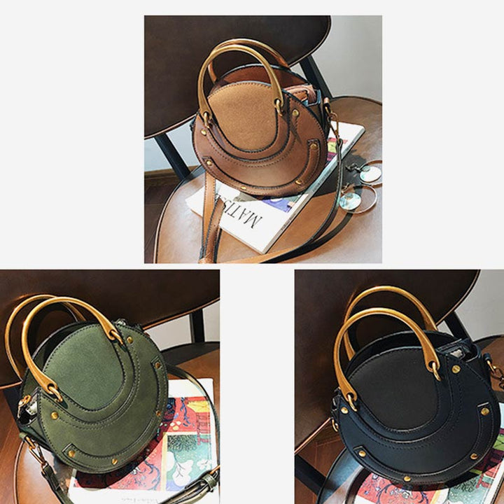 Elegante, runde Top-Grifftasche mit großem Fassungsvermögen und metallischem Griff