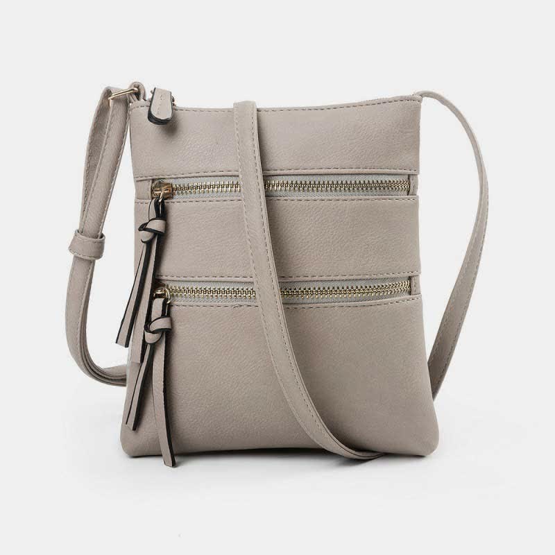 Multifunktionale Umhängetasche mit dreifachem Reißverschluss und trendigem Design aus Leder