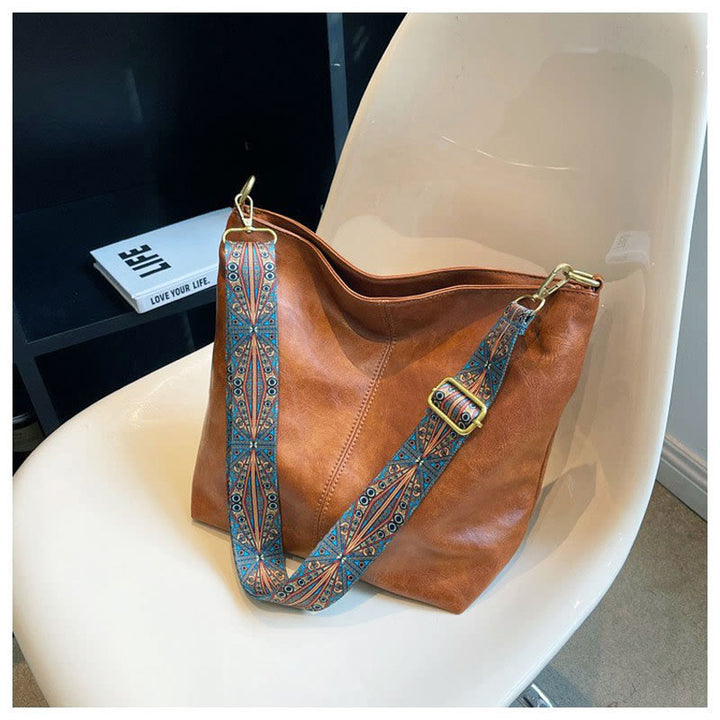 Retro-Umhängetasche für Damen mit breiten Riemen, raffinierte Tragetasche