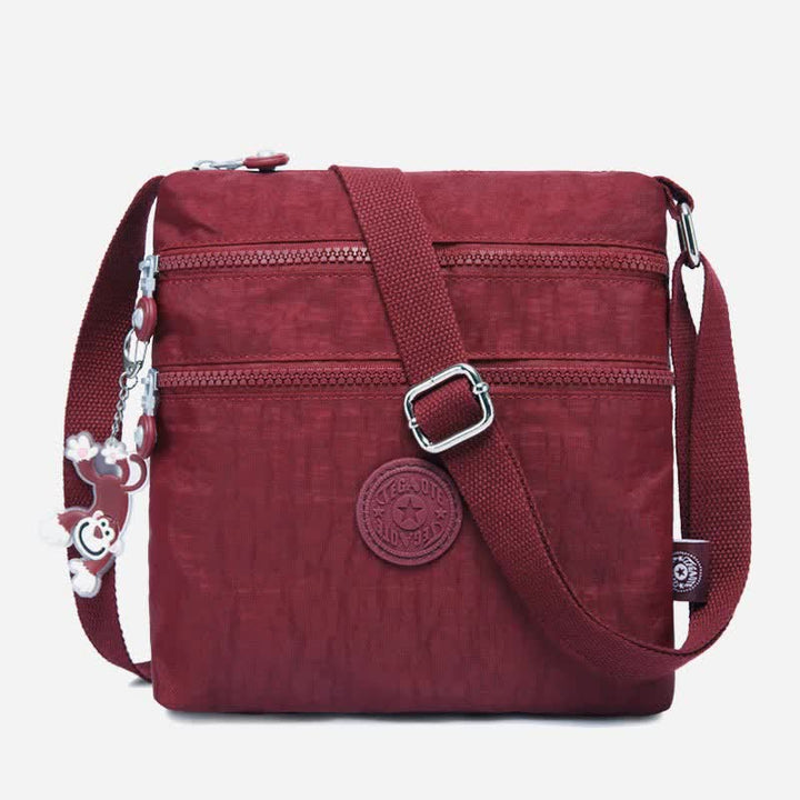 Leichte kleine Crossbody-Tasche mit Dreifach-Reißverschluss, Schultertasche für Damen