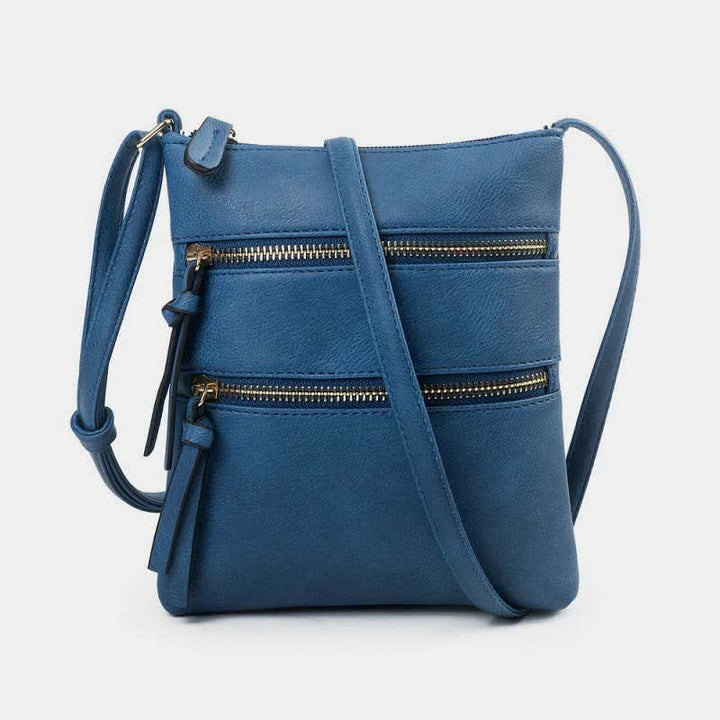 Multifunktionale Umhängetasche mit dreifachem Reißverschluss und trendigem Design aus Leder