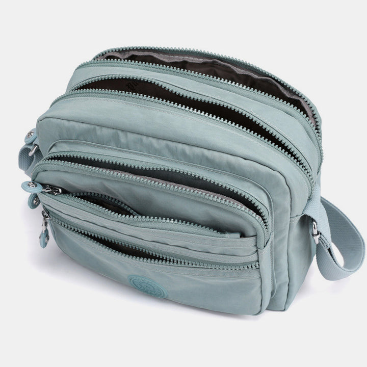 Lässige Umhängetasche mit mehreren Taschen und leichtem Design