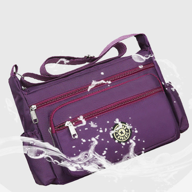 Wasserdichte Umhängetasche mit mehreren Taschen und Aufdruck