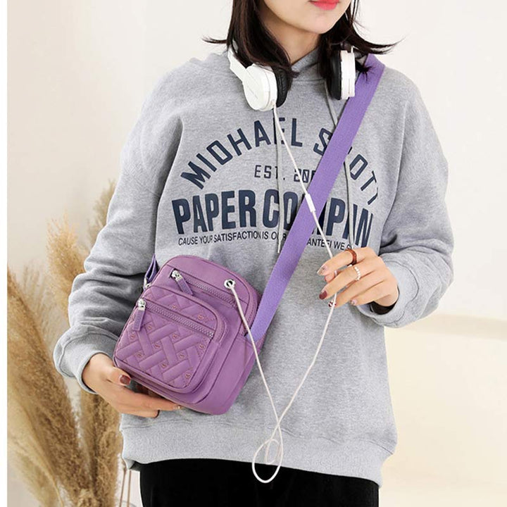 Lässige Umhängetasche aus Nylon mit mehreren Taschen und Loch für Kopfhörer