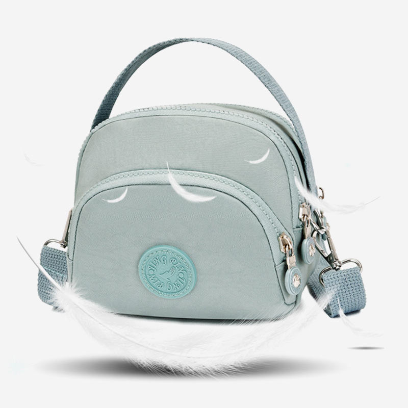 Leichte, wasserabweisende Handtasche für Damen mit mehreren Taschen