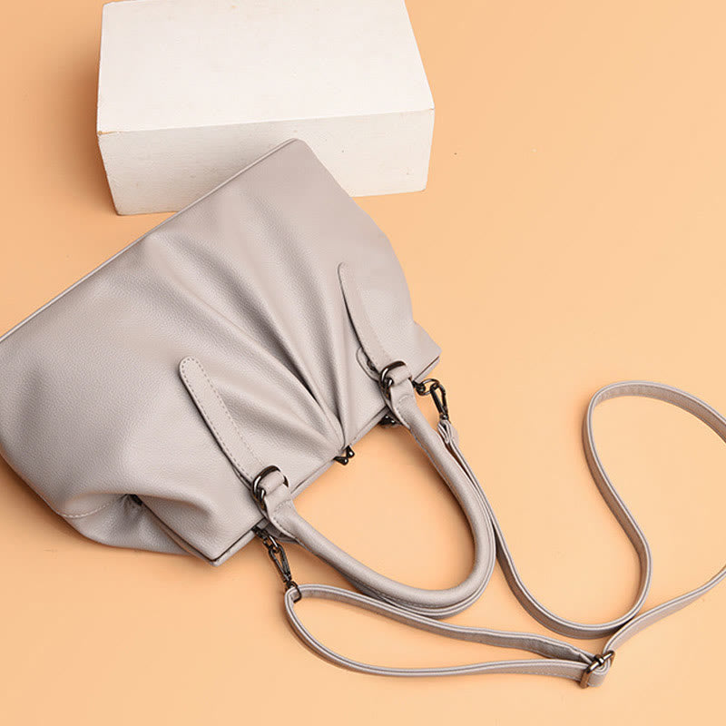 Große Umhängetasche aus echtem Leder mit plissiertem Design für Damen