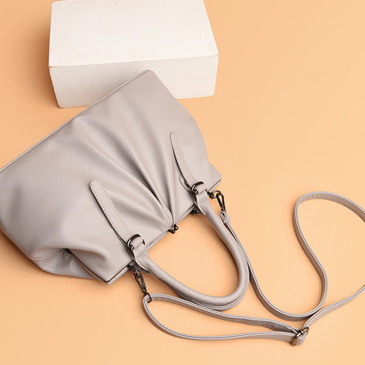 Große Umhängetasche aus echtem Leder mit plissiertem Design für Damen