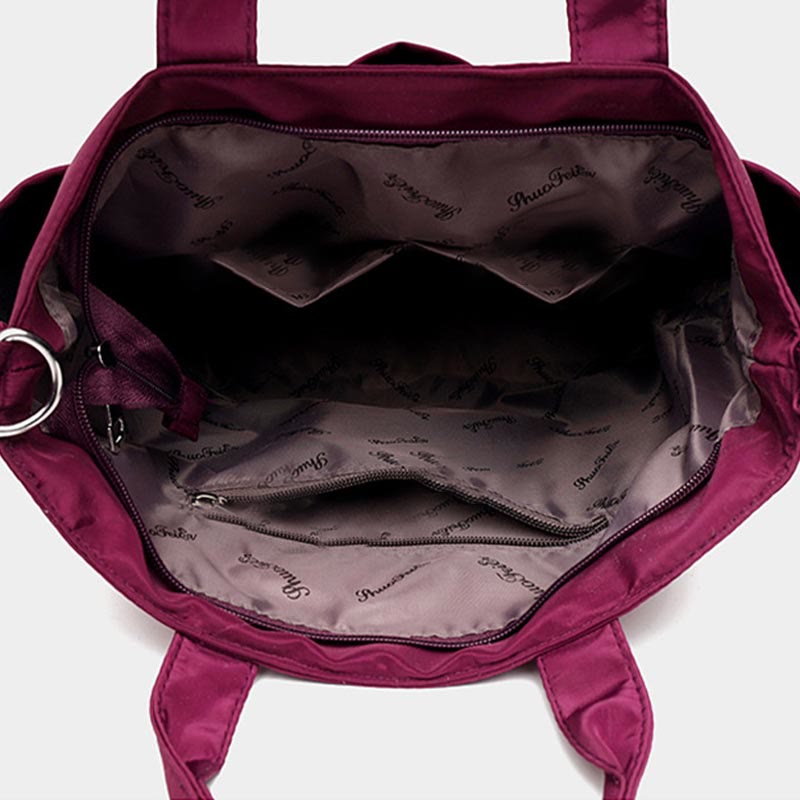Tragetasche für Damen, minimalistische, wasserdichte Umhängetasche aus Oxford-Gewebe in Lila
