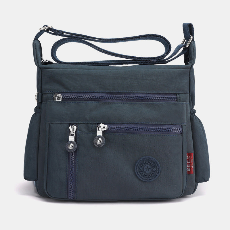 Große, wasserdichte, leichte Umhängetasche mit mehreren Taschen - Mitternachtsblau - image 17