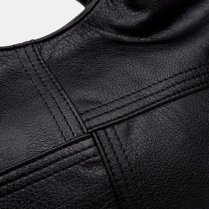 Weiche Lederhandtasche mit Nähten und fester Umhängetasche