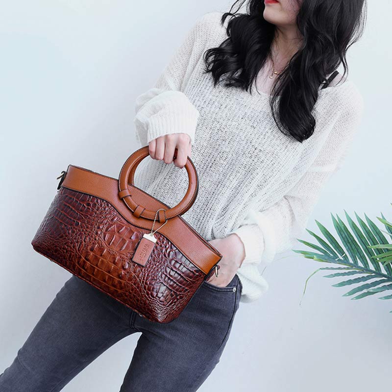 Umhängetasche mit großem Fassungsvermögen und Vintage-Prägung und Henkeltasche