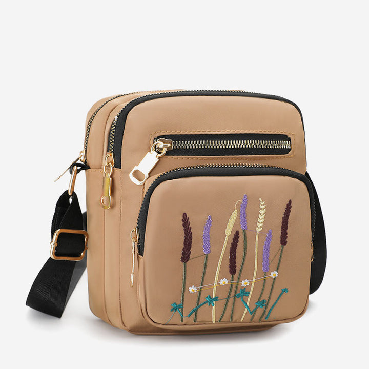 Leichte, wasser- und reißfeste Umhängetasche für Damen mit mehreren Taschen und Stickereien