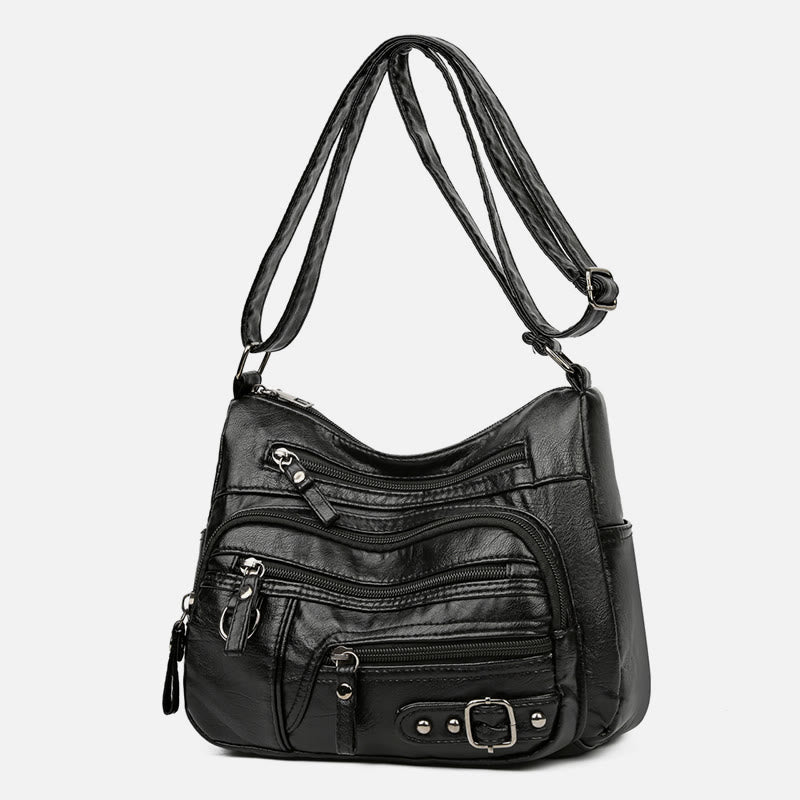 Minimalistische Ledergeldbörse mit mehreren Taschen für Damen. Organisierte Umhängetasche