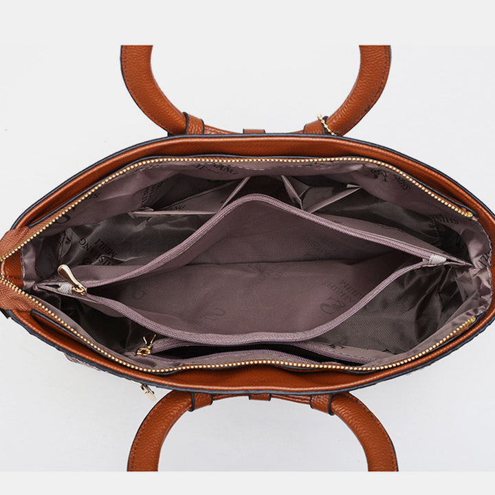 Umhängetasche mit großem Fassungsvermögen und Vintage-Prägung und Henkeltasche
