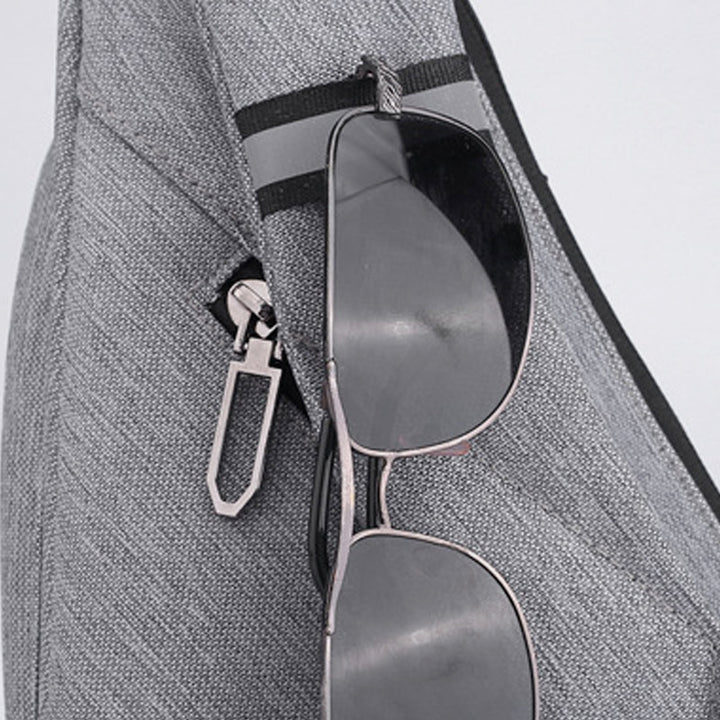 Wasserdichte, leichte, multifunktionale, stahlsichere Schultertasche mit Kopfhöreranschluss
