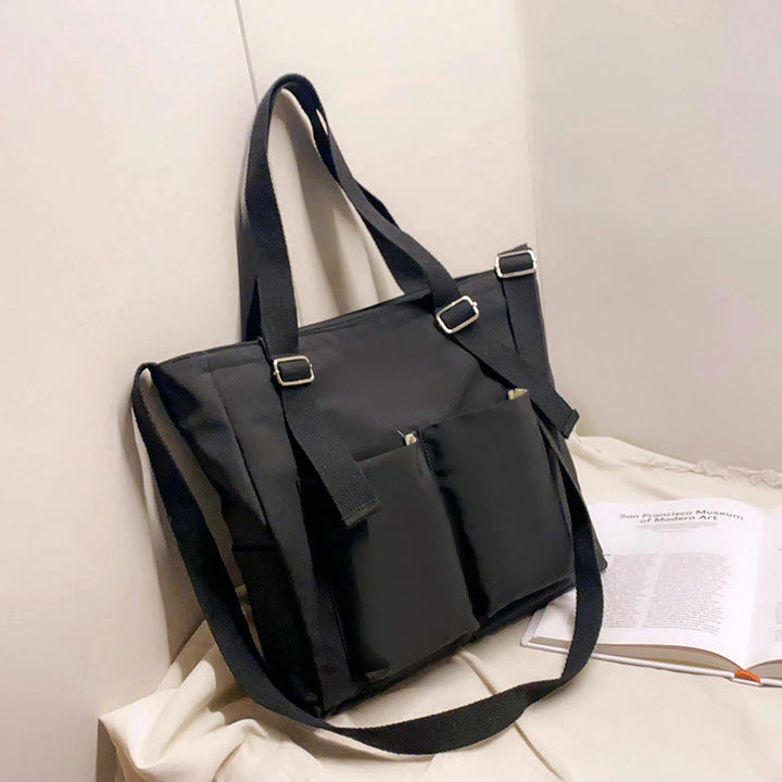 Große Tragetasche aus Canvas mit mehreren Taschen, funktionale Umhängetasche