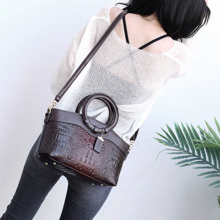 Umhängetasche mit großem Fassungsvermögen und Vintage-Prägung und Henkeltasche